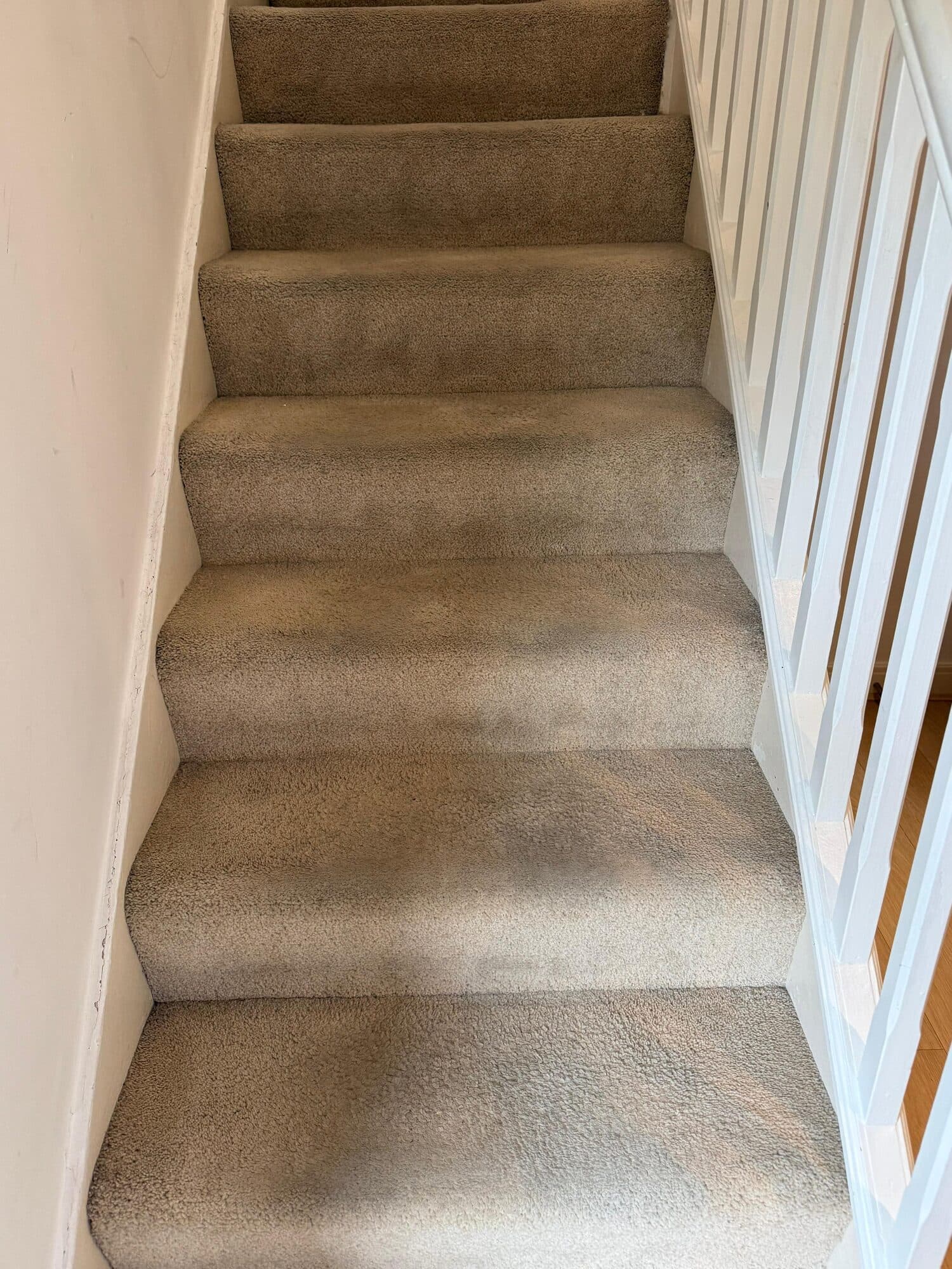 Soiled stair carpet from foot traffic